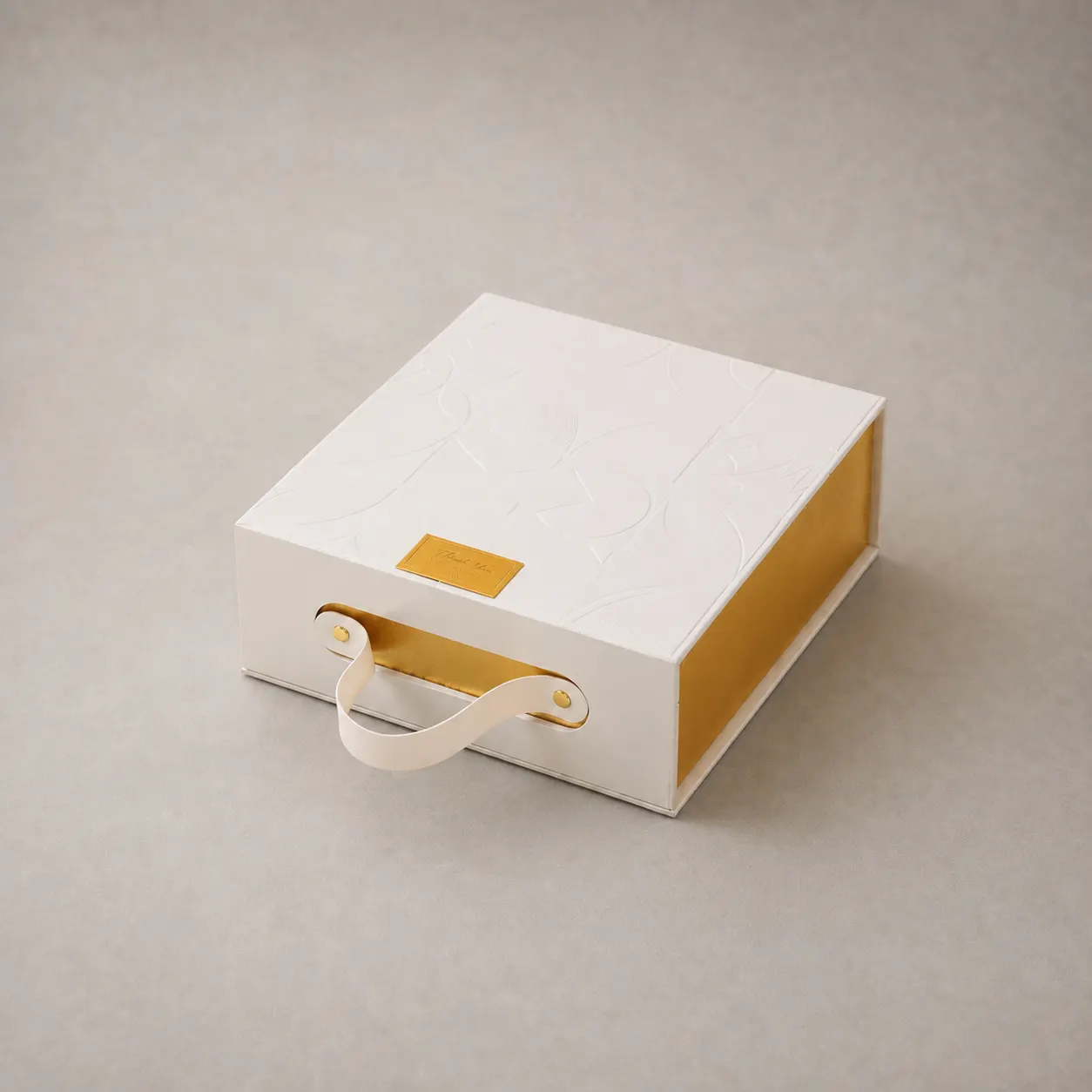 Luxury White Embossed Petal Handbag Box with Satin Gold Rails — image 1 of 4