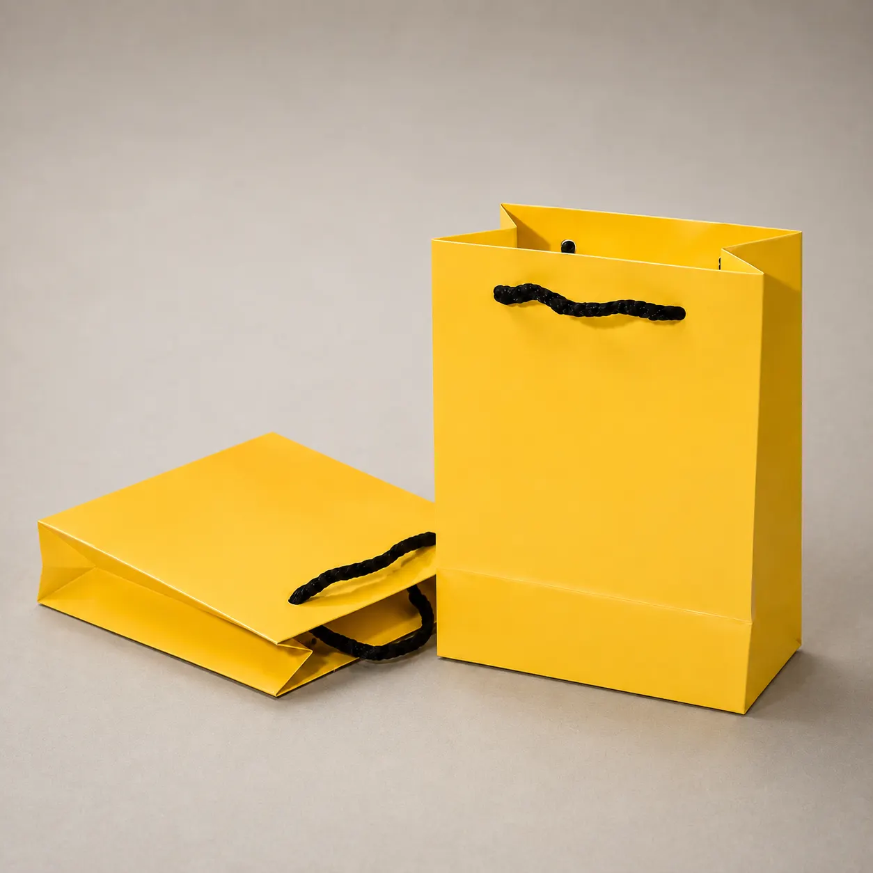 Minimalist Canary Yellow Paper Tote Bag with Black Handles — image 1 of 4
