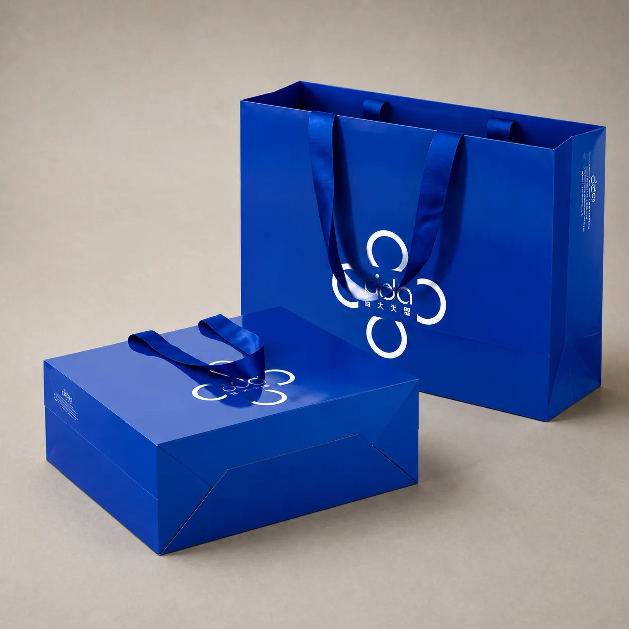 Luxury Royal Sapphire Blue High-Gloss Foldable Paper Tote Bag — image 1 of 4