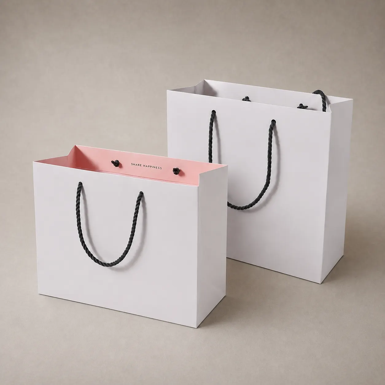 Minimalist White Paper Tote Bag with Black Handles & Pink Interior — image 1 of 4