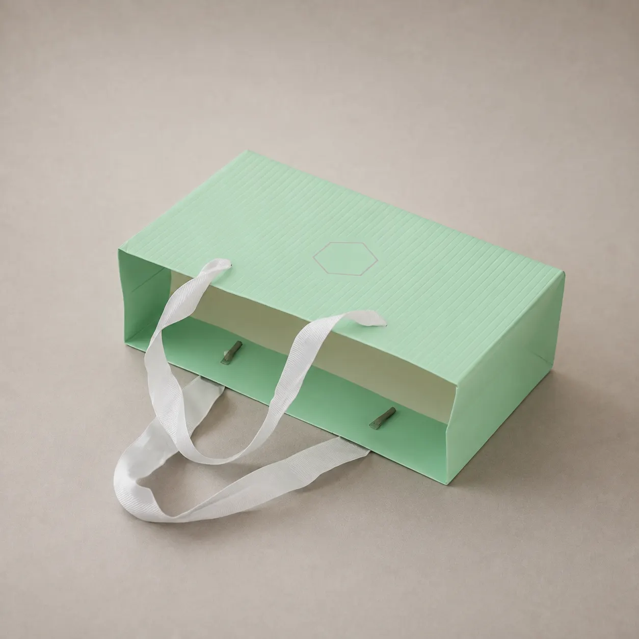 Luxury Mint Green Embossed Stripe Paper Tote Bag with White Ribbon — image 1 of 4